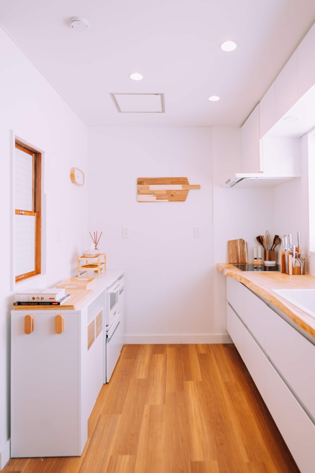 Hakuba Lodge — Kitchen — clean lines, warm wood
