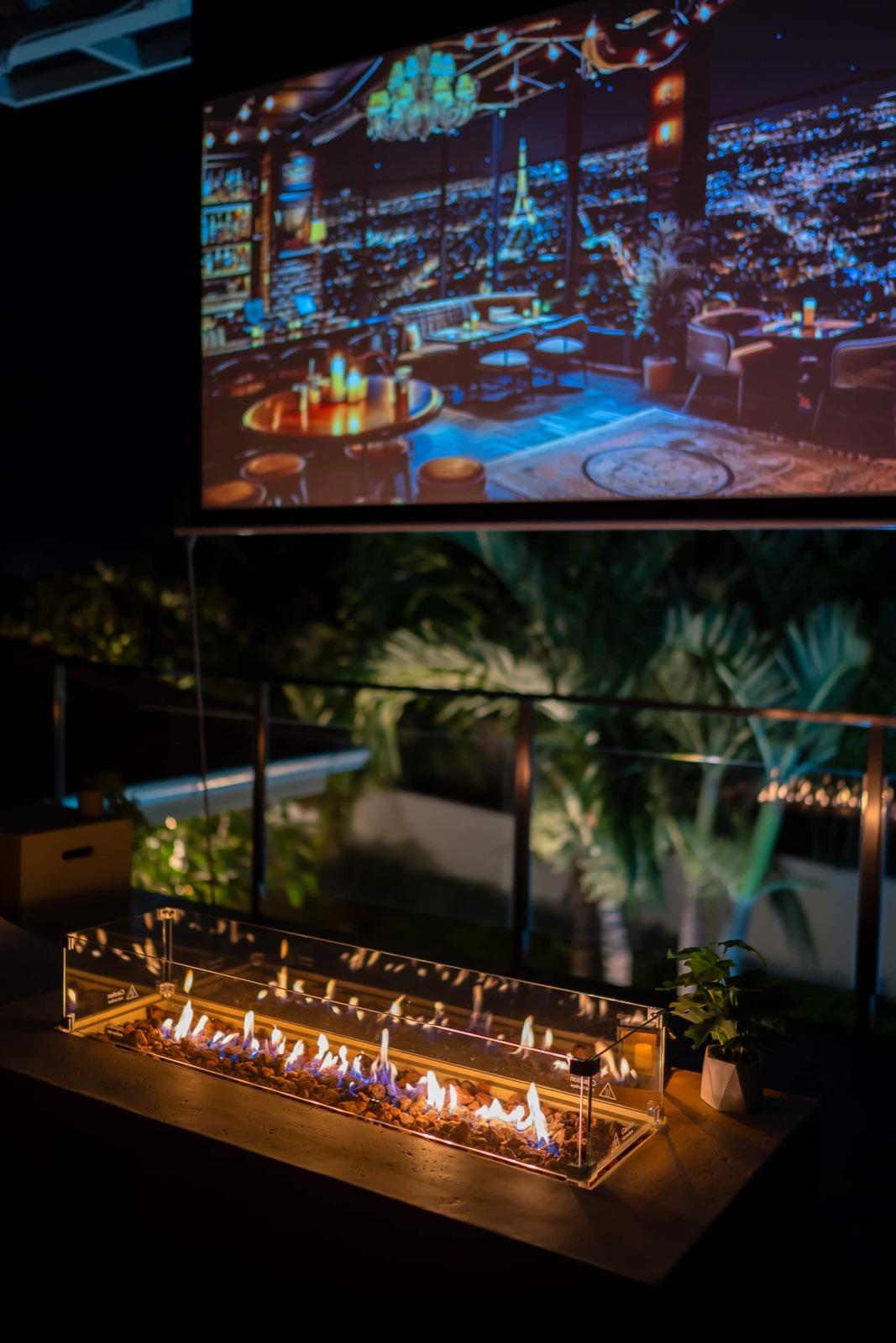 Kira 煌 — Rooftop lounge and fire pit at night