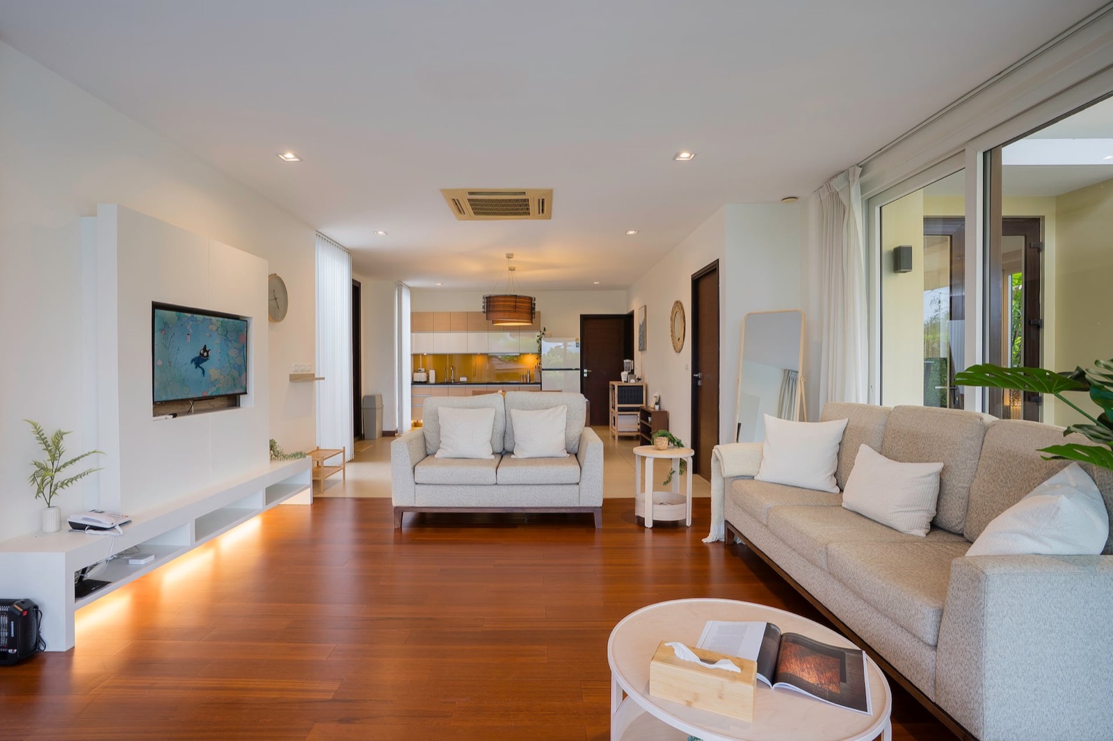 KUMO 雲 — Open-plan living room filled with natural light