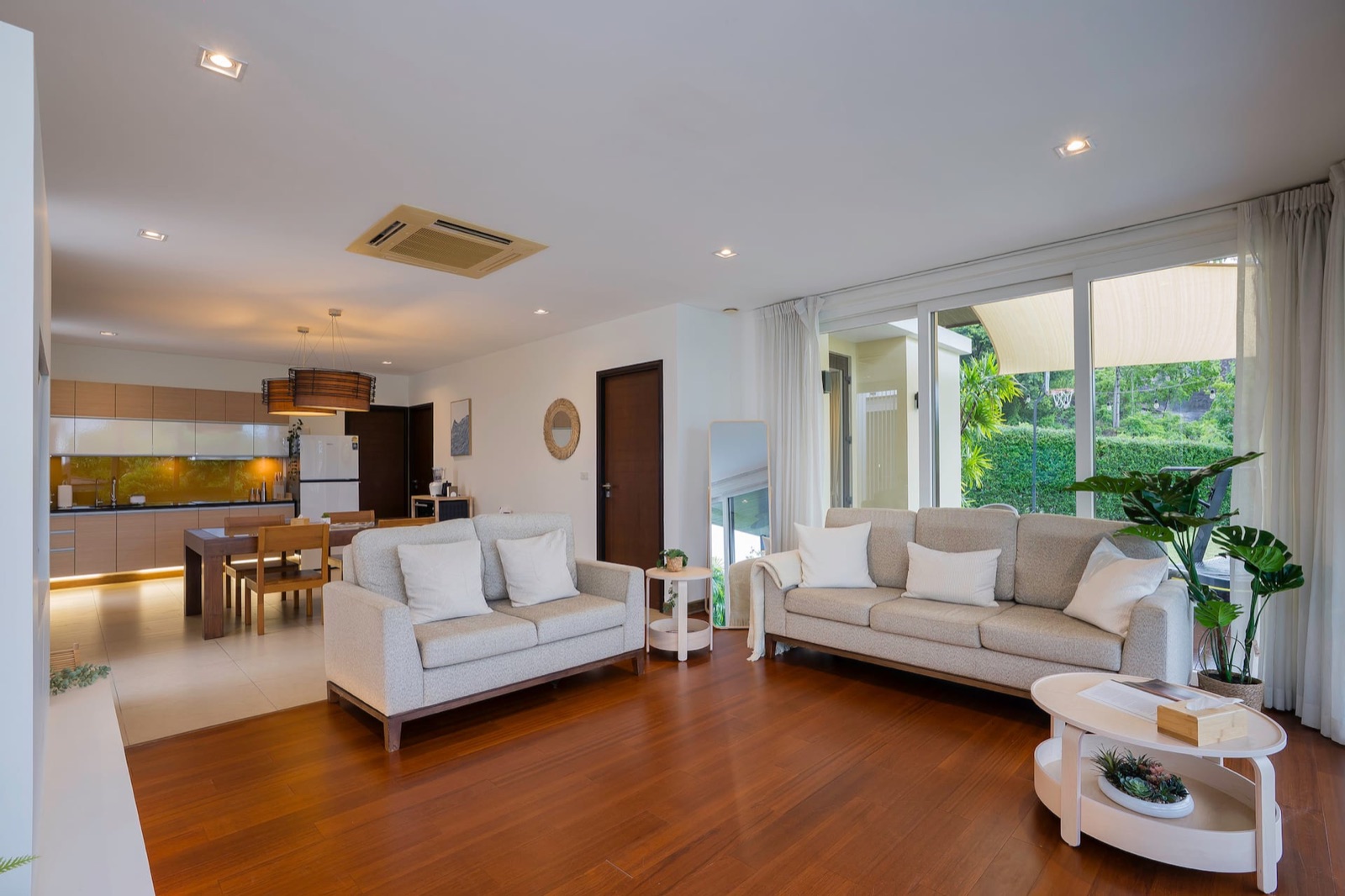 KUMO 雲 — Living area with plush sofas