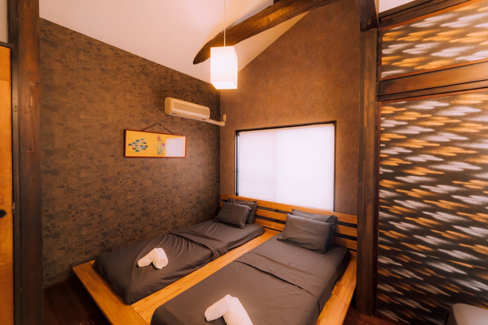 Shinobi House — Bedroom with two double beds