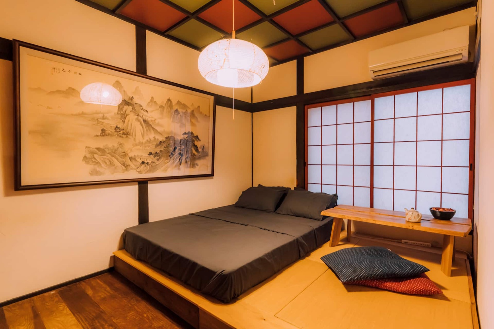 Shinobi House — Tatami room with low futon