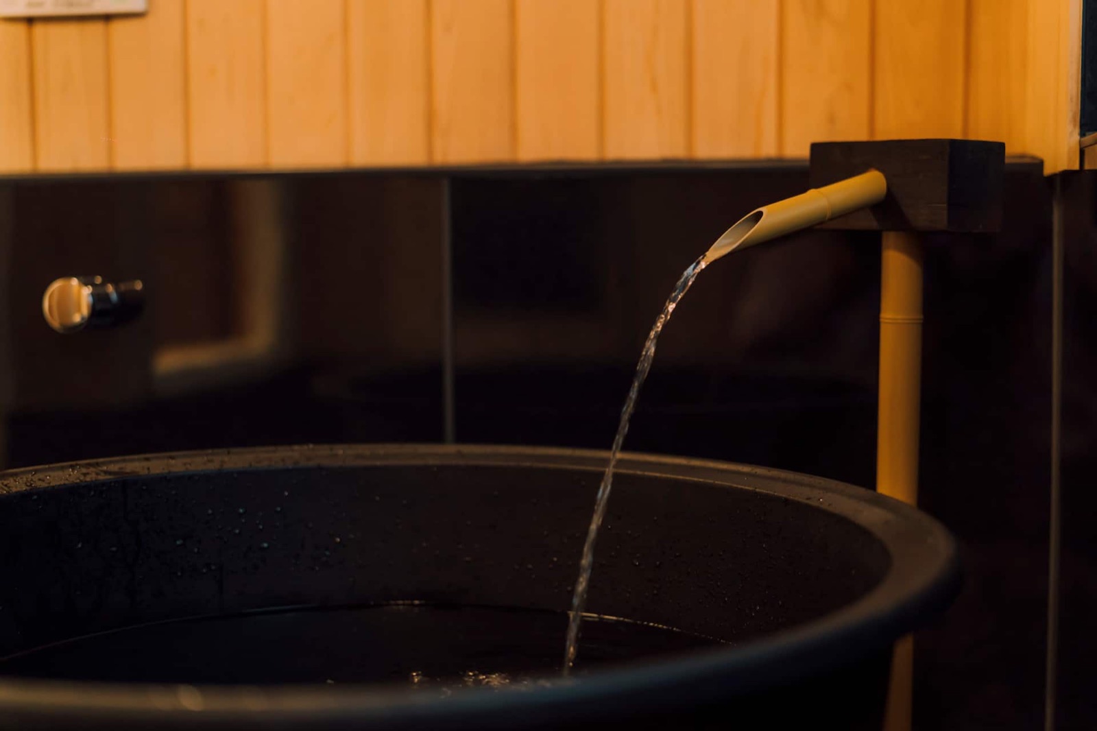 Shinobi House — Bathroom with the 100-year-old cast-iron bathtub