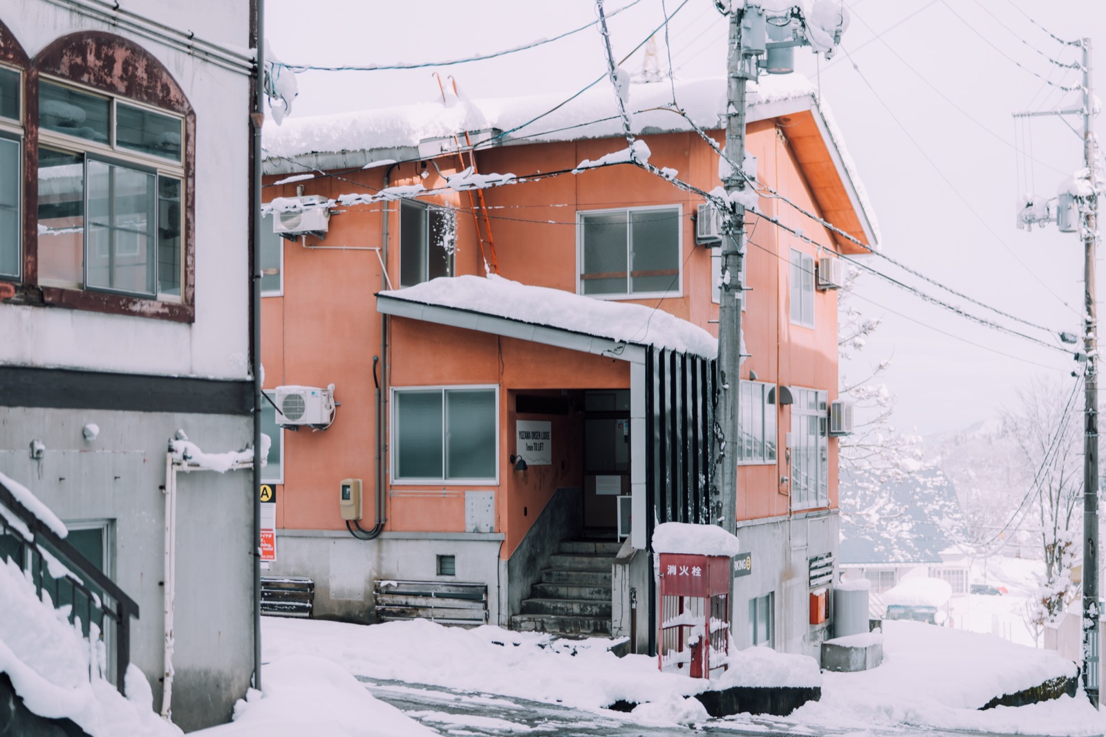 Yuzawa Onsen Lodge — The two lodges in deep snow — Ishiuchi, Yuzawa