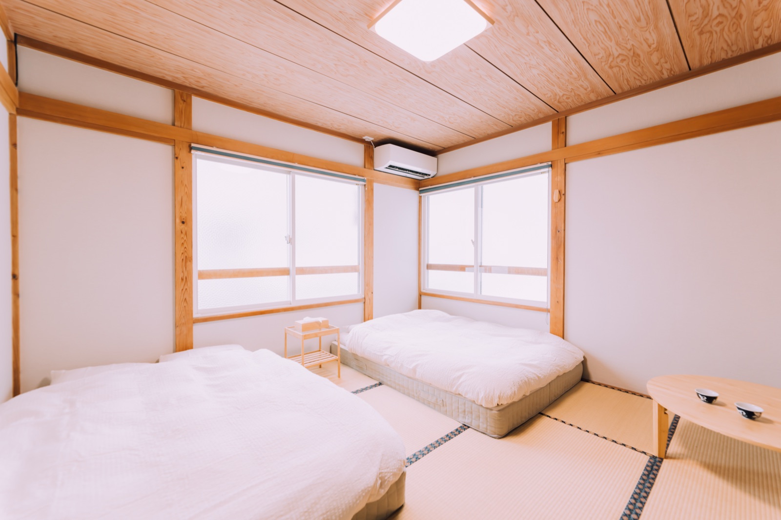 Yuzawa Onsen Lodge — Tatami bedroom with futons